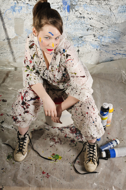 Attraktive Female artisan with paint roller - Fotó, kép