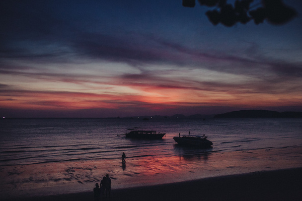 Fishing boats over Dramatic sunset sky - Фото, зображення