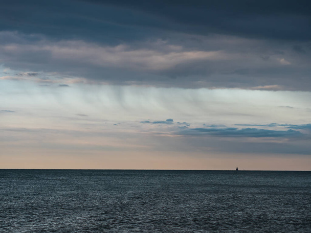 Adriatic Sea Ocean Horizon with Cargo Ship Silhouette in Grado, Olaszország - Fotó, kép