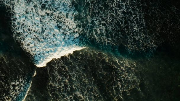 Surf. The ocean wave rolls over. Photo from a height - Foto, Imagem