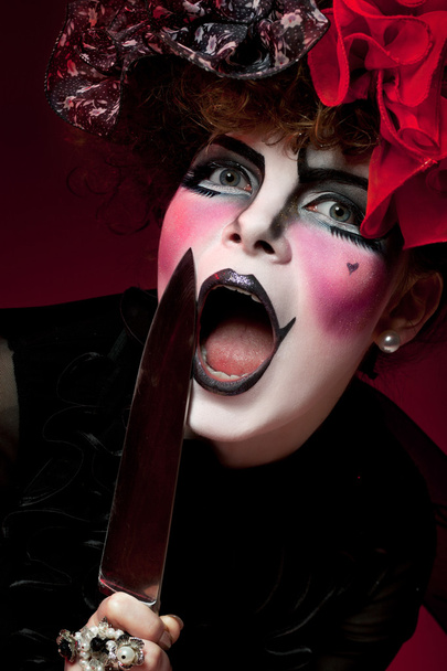 Woman mime with knife - Photo, image