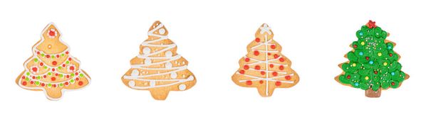 Set of new year xmas tree homemade gingerbread cookies isolated on white background. - Photo, image