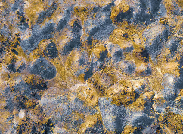 Contaminated surface of spoil heaps from mining at abandoned pyrite mine. Colorful texture, aerial view directly above - Photo, Image