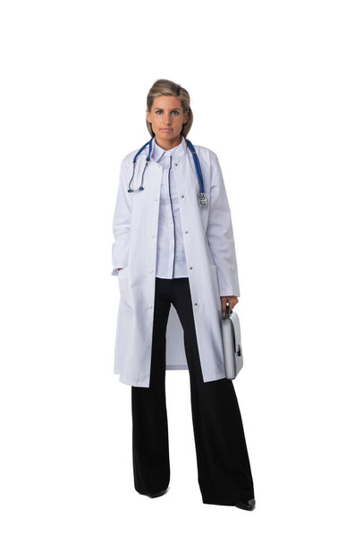 Female medical doctor with stethoscope standing isolated on white background, full length portrait - Foto, Imagem