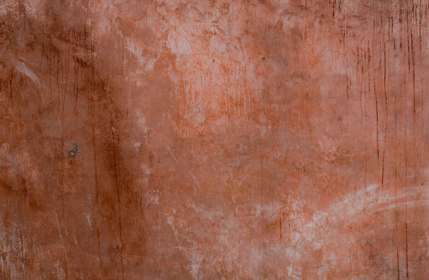 A background of old testured red wall - 写真・画像