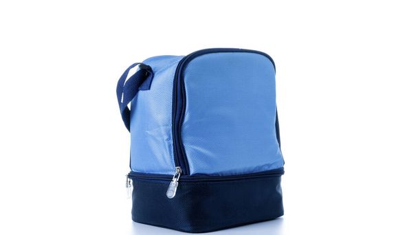 Blauwe tas. Vriezer, koelbox voor koude lunch eten geïsoleerd op witte achtergrond. Blauwe tas voor onderweg, picknick - Foto, afbeelding
