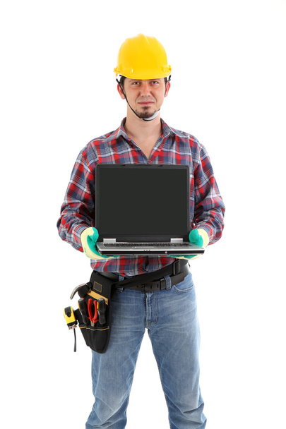 Trabalhador da construção mostrando laptop
 - Foto, Imagem