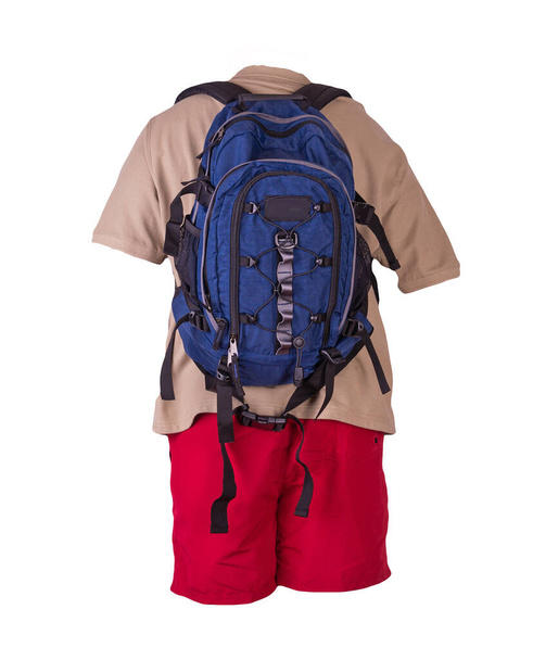 denim blue backpack,red sports shorts,biege shirt with a collar with buttons isolated on white foane. clothes for every day - Photo, image