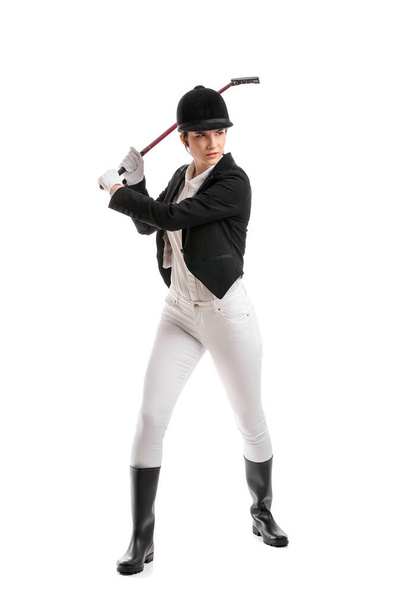 Beautiful female polo player on white background - Foto, imagen