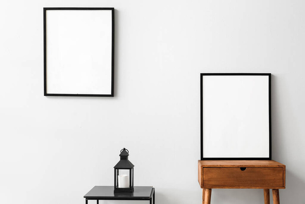 Blank poster frames in light room - Photo, Image