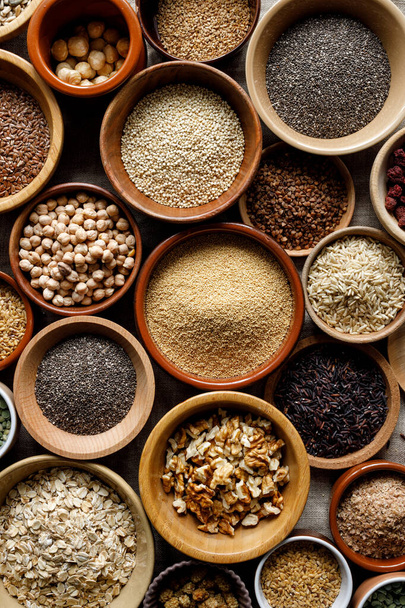 A healthy food mix of grains, groats, dried fruits and nuts, close up view. Super food  - Foto, Imagem