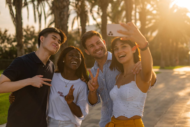 Diverse friends having fun and taking selfie - Photo, Image