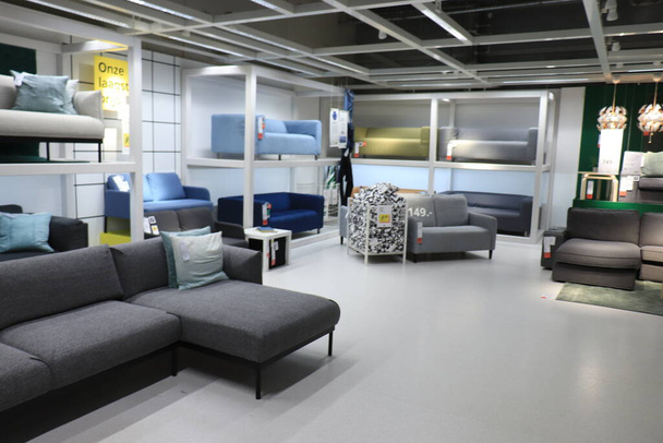 Haarlem, the Netherlands - October 9th, 2021: Ikea store showroom. Affordable couches on display - Фото, зображення