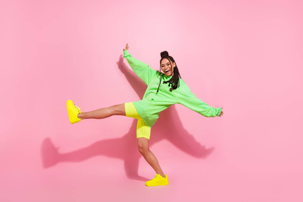 Full body profile side photo of dark skin young cheerful lady good mood smile dance isolated on pink color background - Φωτογραφία, εικόνα