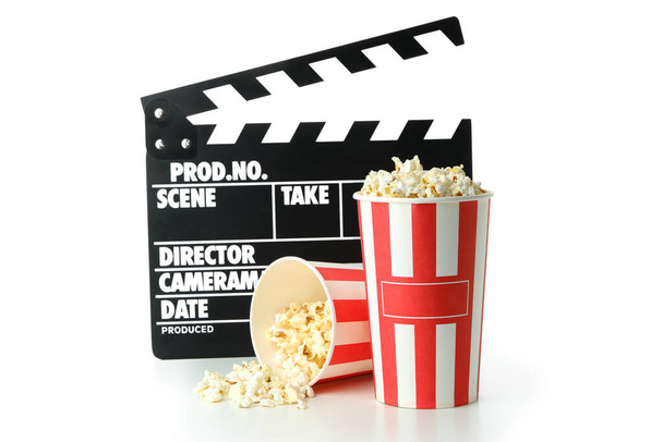 Clapperboard and popcorn isolated on white background. - Photo, Image
