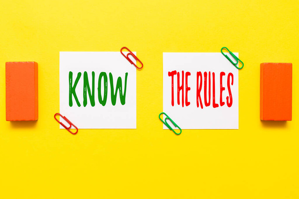 Text sign showing Know The Rules. Business approach set explicit or regulation principles governing conduct Critical Thinking Finding Clues Answering Questions Collecting Data - Photo, Image