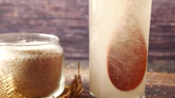  mixing Psyllium Seeds in a glass of water  - Footage, Video