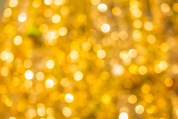 oro abstracto brillo desenfoque bokeh luces uso para fondo - Foto, Imagen