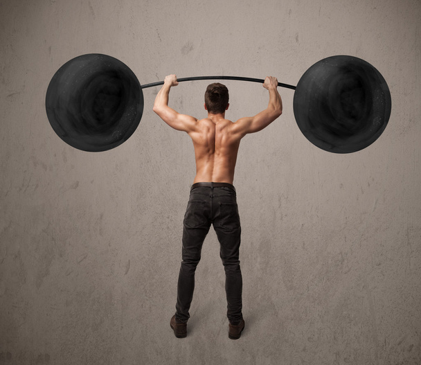 muscular man lifting weights - 写真・画像