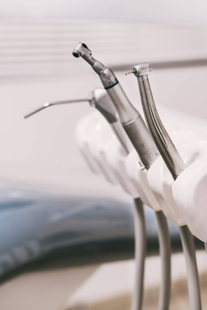 A vertical shot ofn electric dental instruments for polish tooth enamel in a dental clinic - Foto, Bild