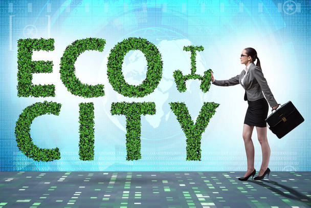 Eco city in ecology concept with businesswoman - Photo, Image