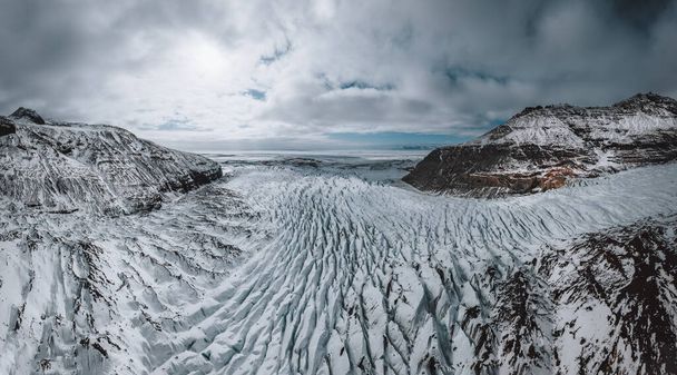 Aerial drone panorama top view glacier iceland svinafellsjoekull, Melting Ice, Climate Change and Global Warming Concept - 写真・画像