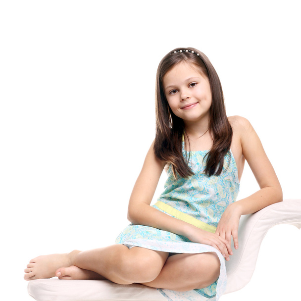 Girl sitting and smiling - Фото, зображення
