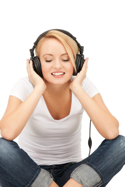 Happy teenage girl in big headphones - Φωτογραφία, εικόνα