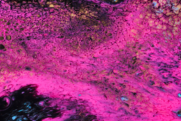 Texture créative lumineuse réalisée par des peintures flottantes. Macro photographie d'encres fluides - Photo, image