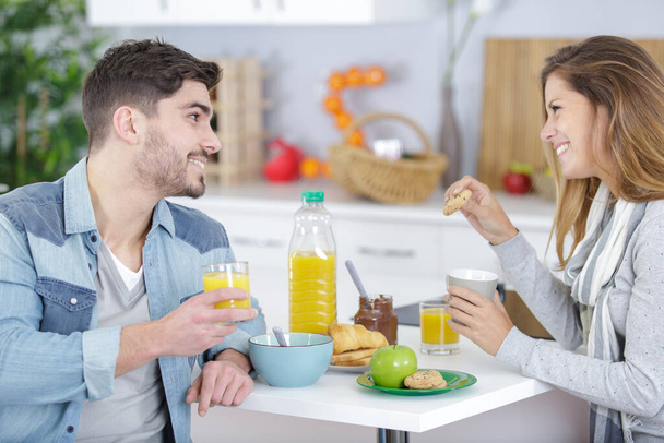 brother and sister having breakfast at their home - Photo, image