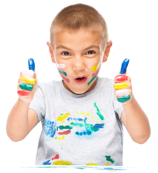 Portrait of a cute boy playing with paints - Φωτογραφία, εικόνα