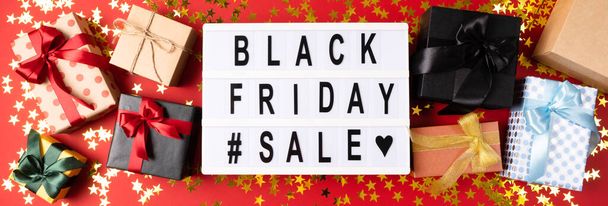Black friday banner with great gifts and the inscription. Festive concept. - Photo, Image