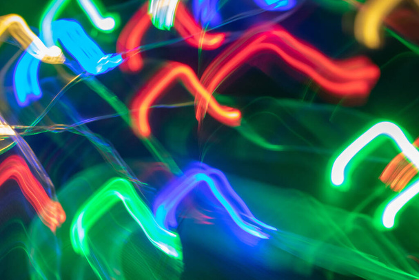 abstract background with moving lights. light painting with long exposure - Foto, Imagen