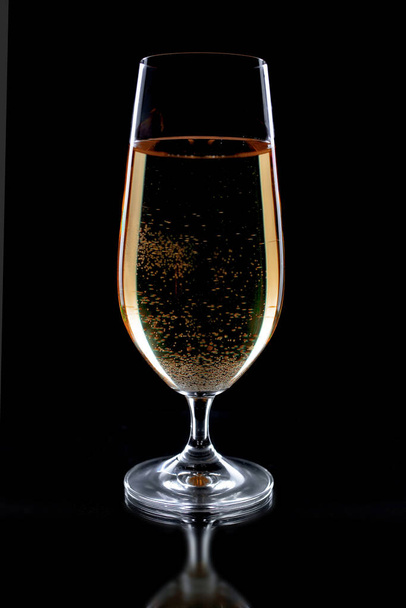 Glasses of wine on a black background. - Zdjęcie, obraz