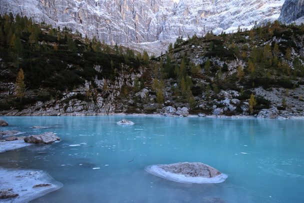 Ice of Lake Sorapiss, Dolomites mountains, Italy - Фото, зображення