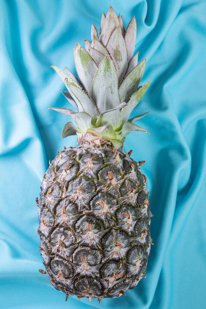 Pineapple on the blue background - Photo, Image