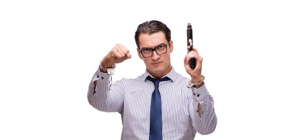 Young businessman with gun isolated on white - Photo, Image