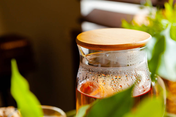 Hot refreshing citrus tea in glass close up - Фото, зображення