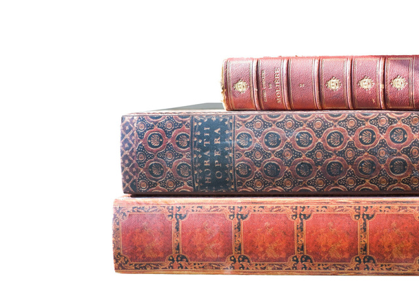 Libros antiguos encuadernados en cuero aislados en blanco
 - Foto, imagen