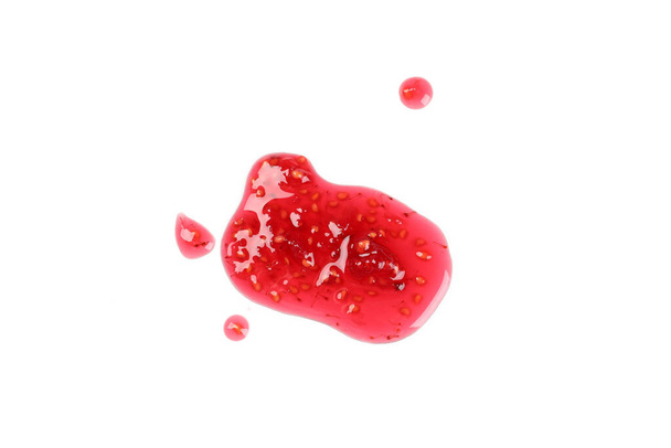 Raspberry jam isolated on  white background, close up - Fotó, kép