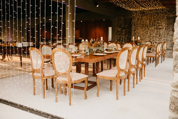 The beautifully decorated elegant wedding table - Фото, изображение