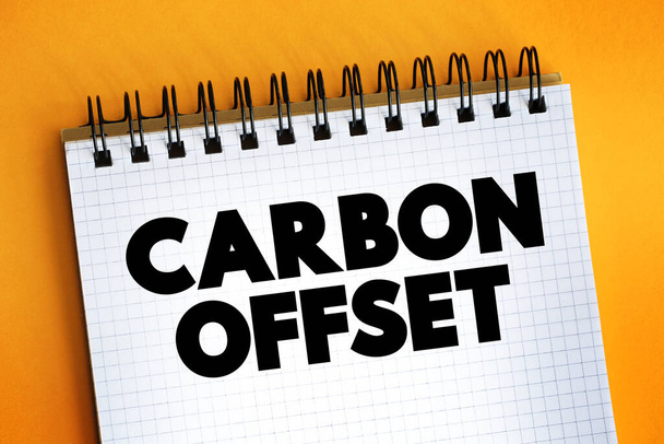 Carbon Offset teksti muistilehtiö, käsite backgroun - Valokuva, kuva