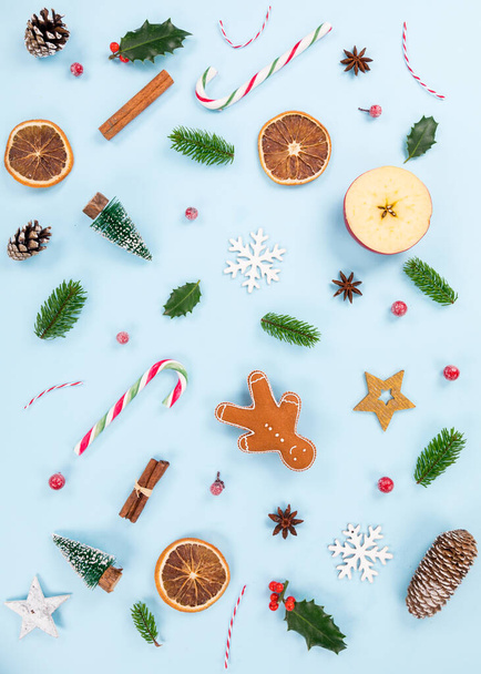 Christmas various decorations on pastel color background. Top-down view. - Foto, Imagen
