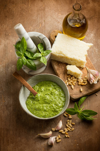 bowl with traditional italian pesto and ingredients - Photo, Image