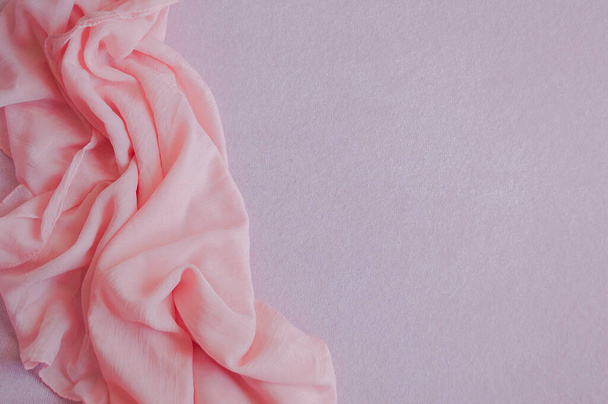 pink silk and knitted fabric close up view. Textile background - Foto, imagen