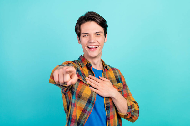 Photo of guy indicate finger you laugh hand chest have fun wear plaid shirt isolated aquamarine color background - Fotó, kép