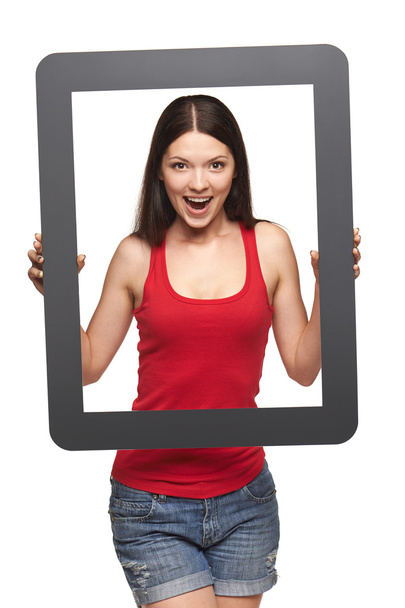 Excited teen girl looking through frame, - Foto, immagini