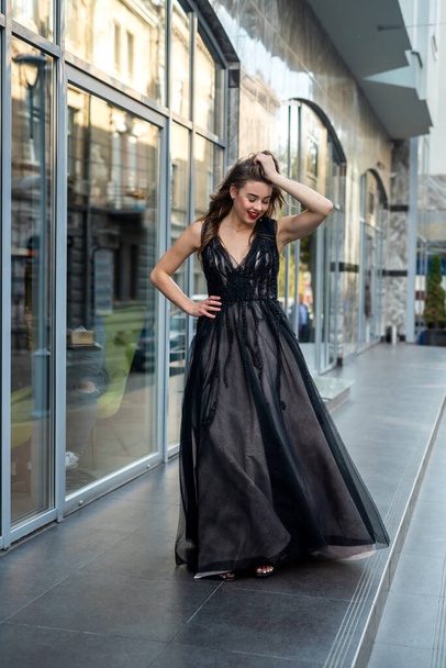  young beautiful lady in dress walking and relax in city. lifestyle - Photo, Image
