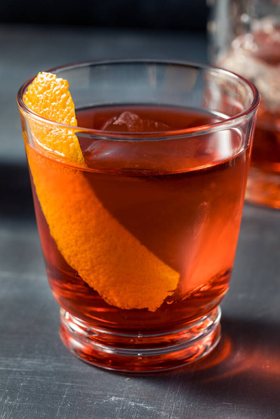 Boozy Cold Mezcal Negroni Cocktail with an Orange Garnish - Foto, Imagem