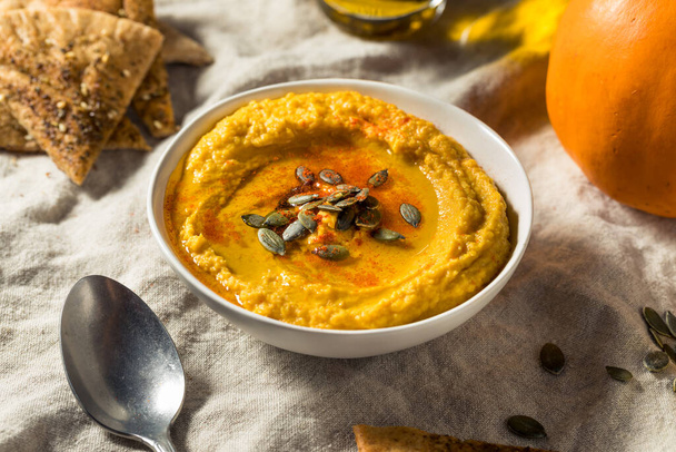 Healthy Organic Pumpkin Spice Hummus with Olive Oil - Photo, image
